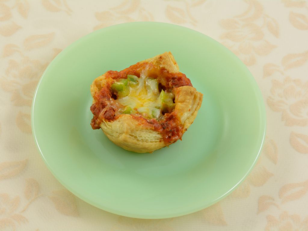 Broughan Blog Posts (26) Pizza puff on a plate.